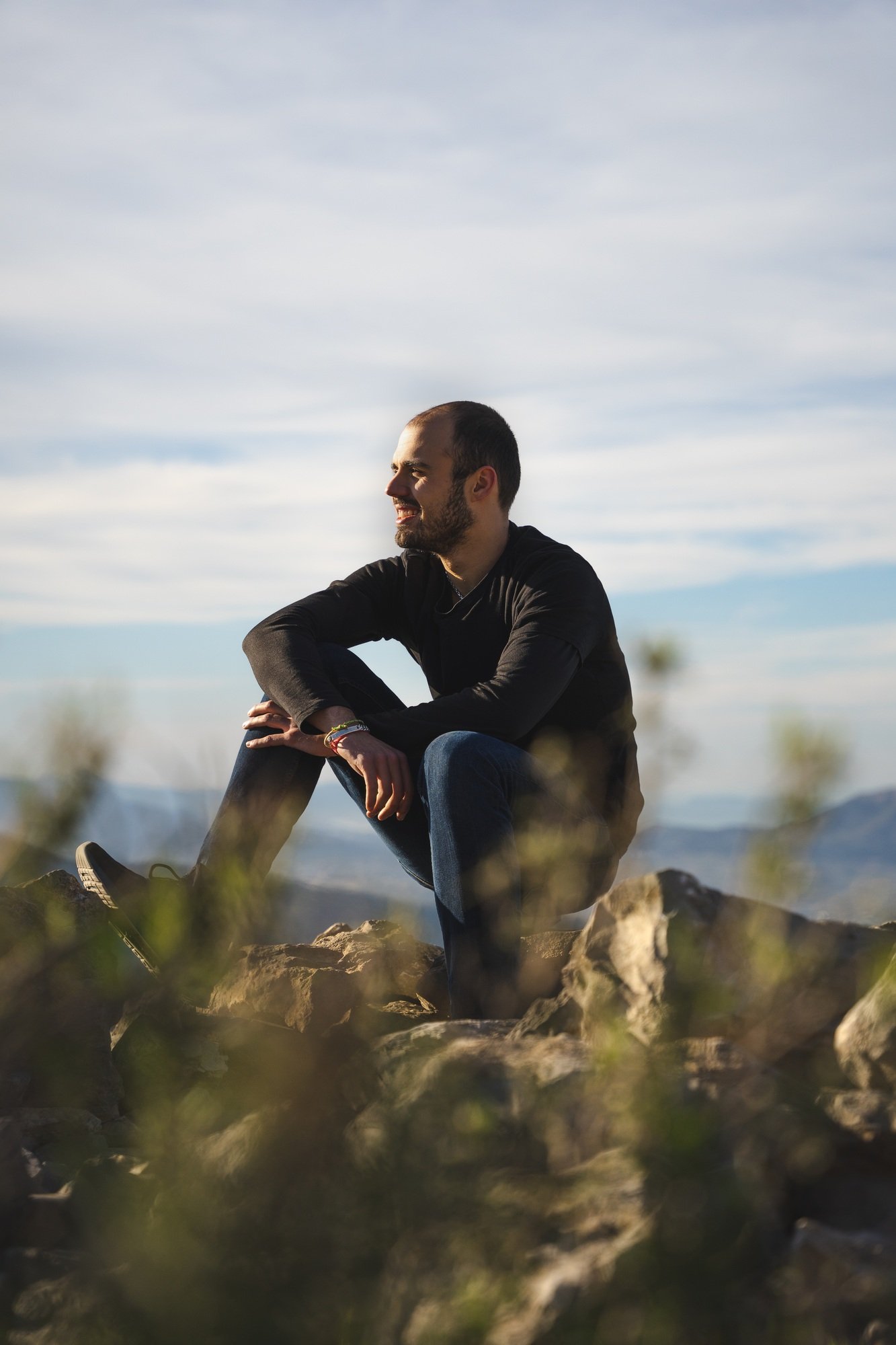 Man sitting on a rock